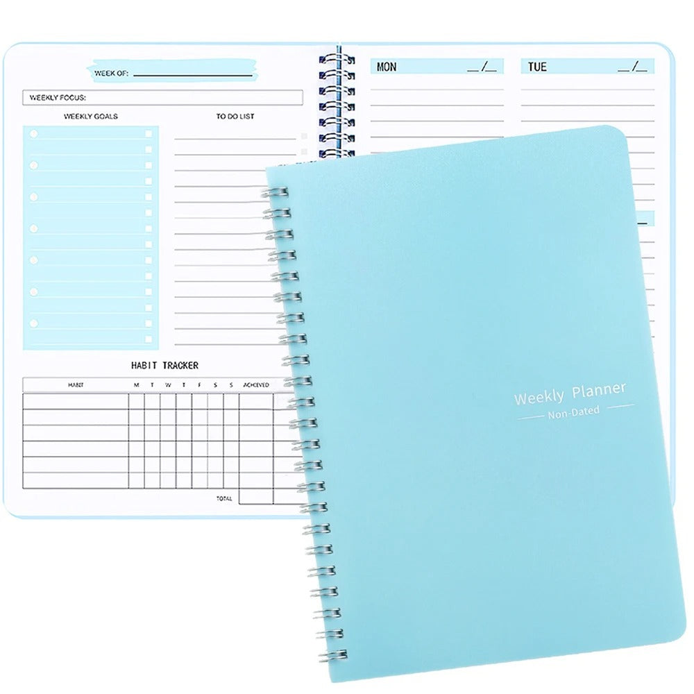 Closed blue weekly planner with open pages behind showing areas to write weekly updates and goals.